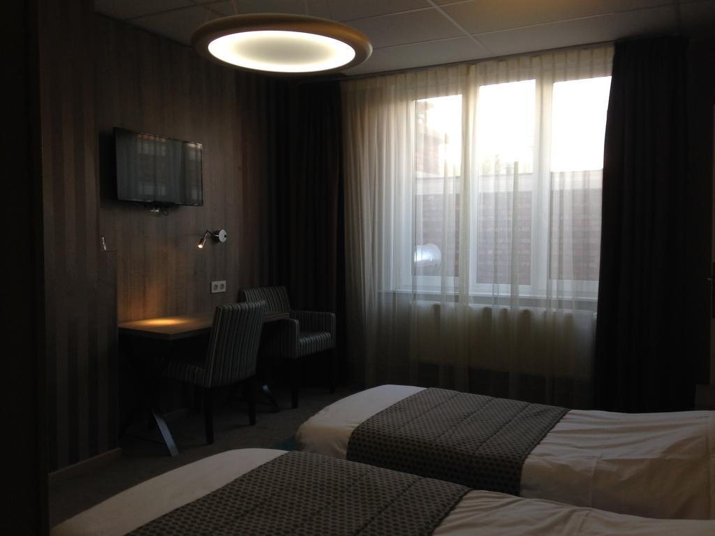 Hotel Mille Colonnes Löwen Zimmer foto