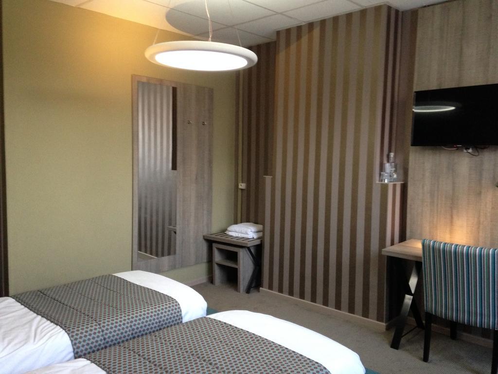Hotel Mille Colonnes Löwen Zimmer foto